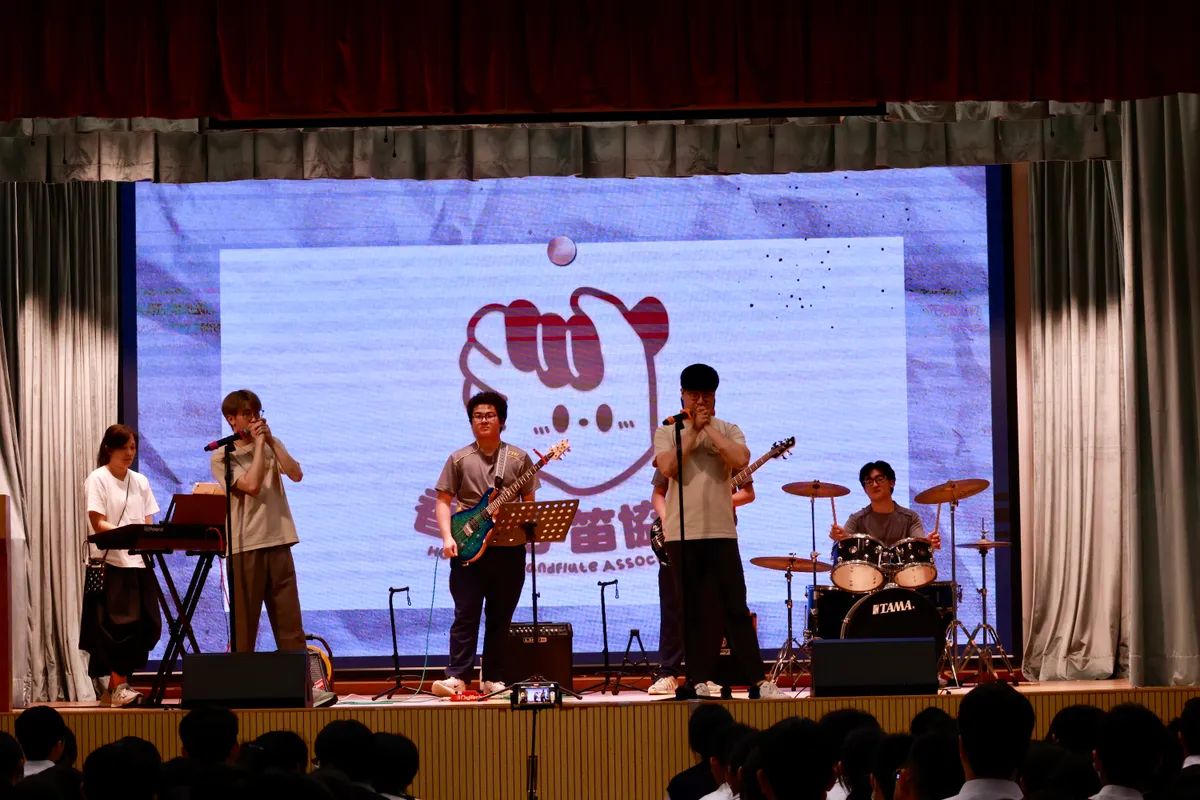 Handflute band performance at a secondary school